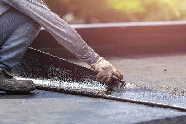Professional Waterproofing technician working in Geneseo, IL